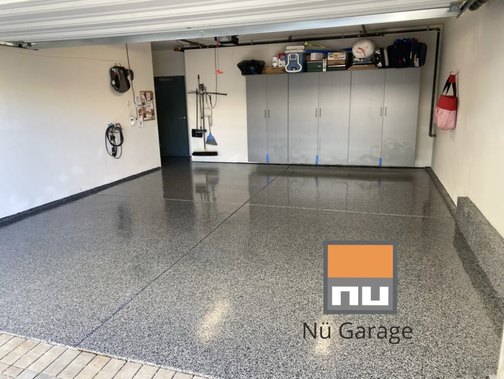 Flake epoxy garage floor by Nu Garage & Epoxy