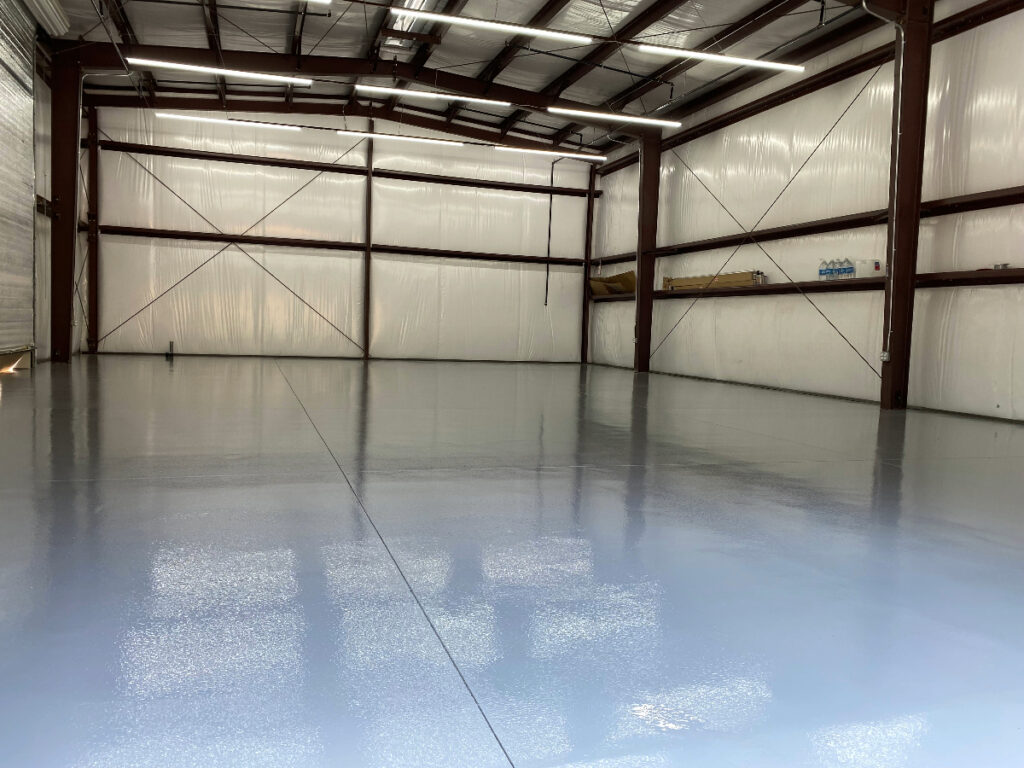 Large shop with a coated concrete floor