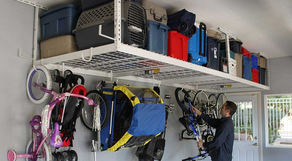 Ceiling storage rack with bins and bike hooks